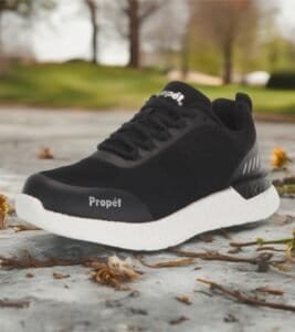 Black athletic shoe on outdoor surface